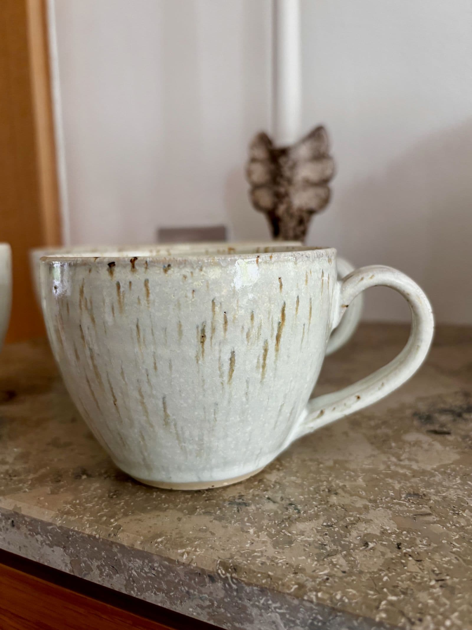 Kaffekopp med öra